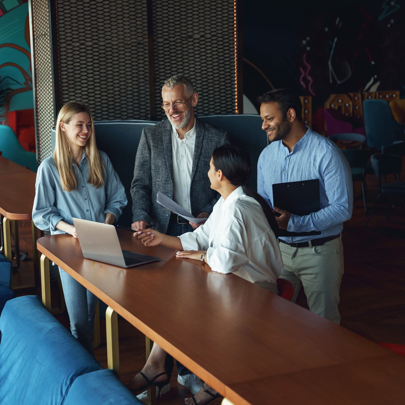 Small business team discussing employee health benefits